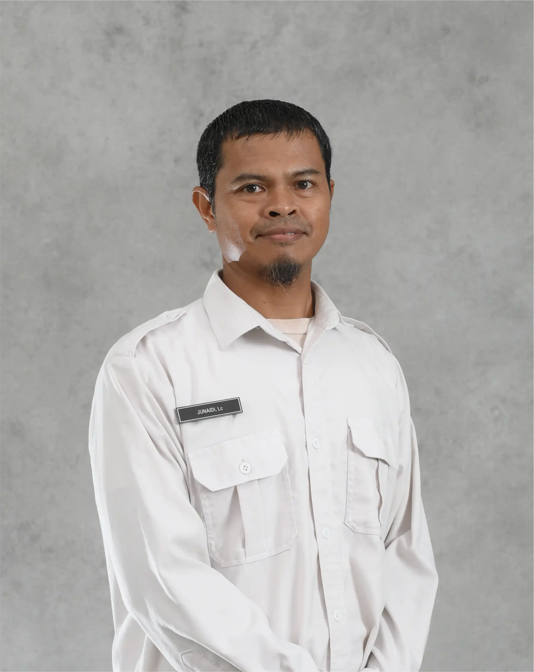 Junaidi, Lc